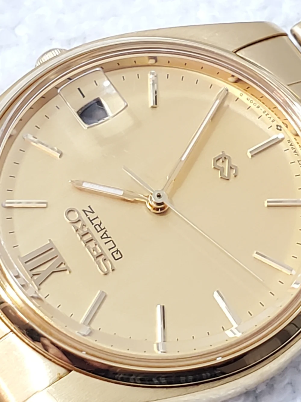 Seiko SQ Vintage Men's Gold Tone Date Quartz Watch Roman Numeral One Jewel